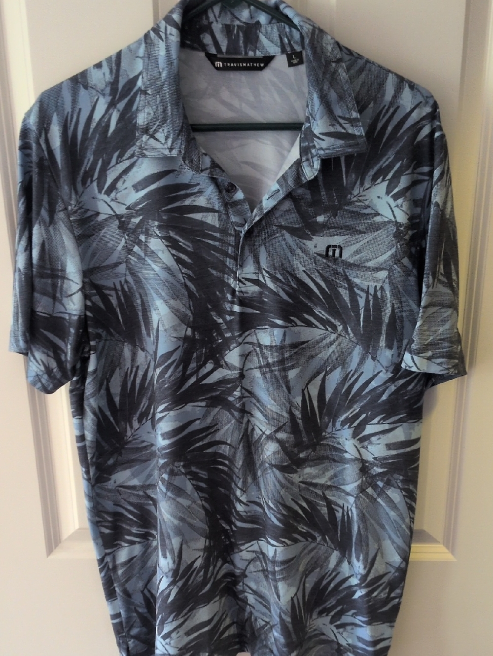 TravisMathew Blue and Black Palm-Leaf Polo